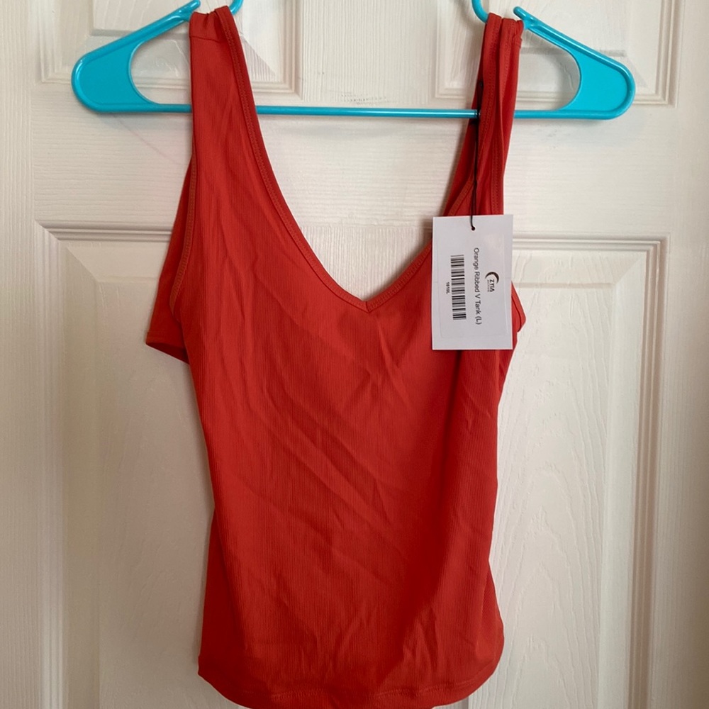 NWT L Zyia Orange ribbed tank open back